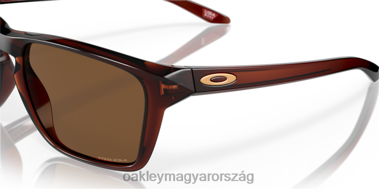 Oakley sylas 6PVBJ324 szemüveg prizm bronz lencsék, polírozott rootbeer váz